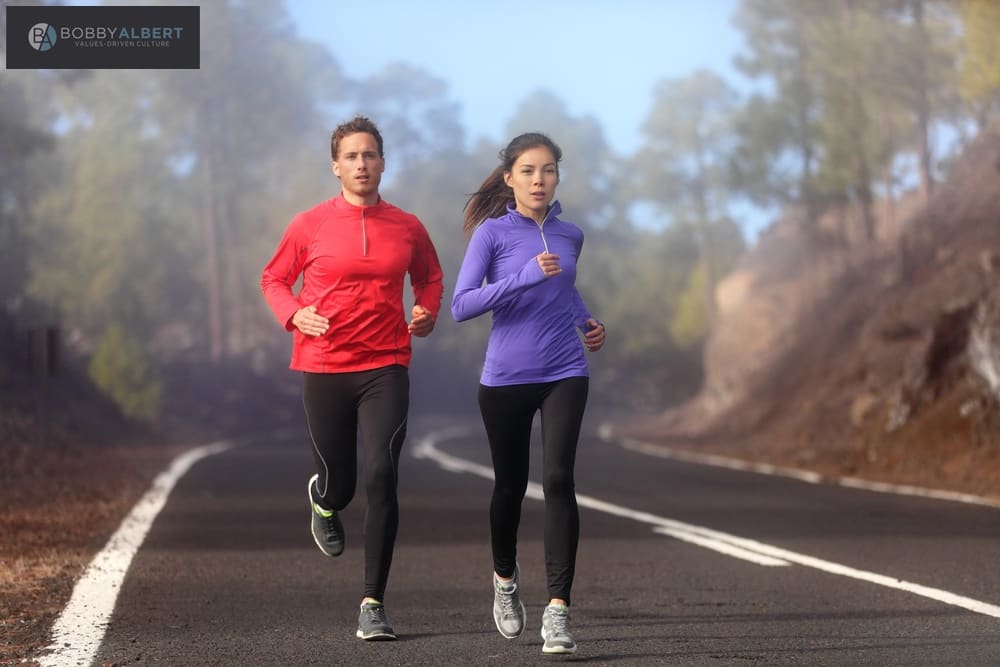 Couple running together and exibiting principled behavior