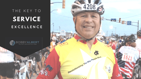 Bobby Albert in his Albert Moving & Storage cycling jersey - displaying customer excellence even on the road!